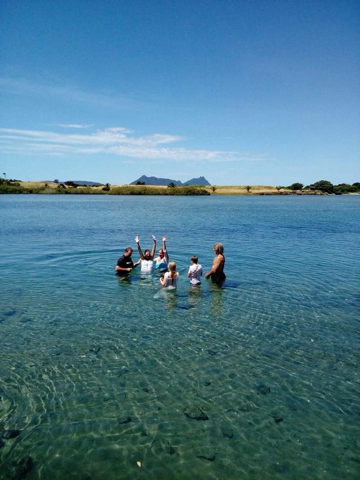 A baptism in the bay near Encounter Church Bream Bay